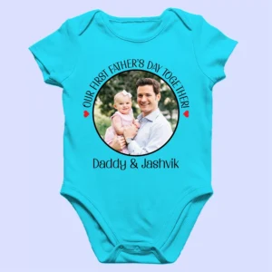 Personalized Father’s Day baby romper flat lay